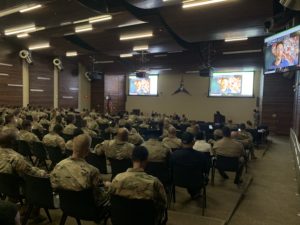 Soldiers from III Corps listen during a professional development session with Simon Sinek